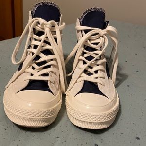 navy blue high top converse